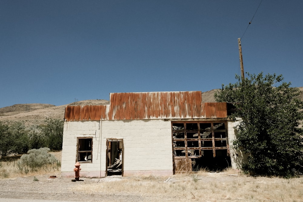 a white building with a red roof