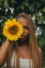 a woman with a flower in her hair