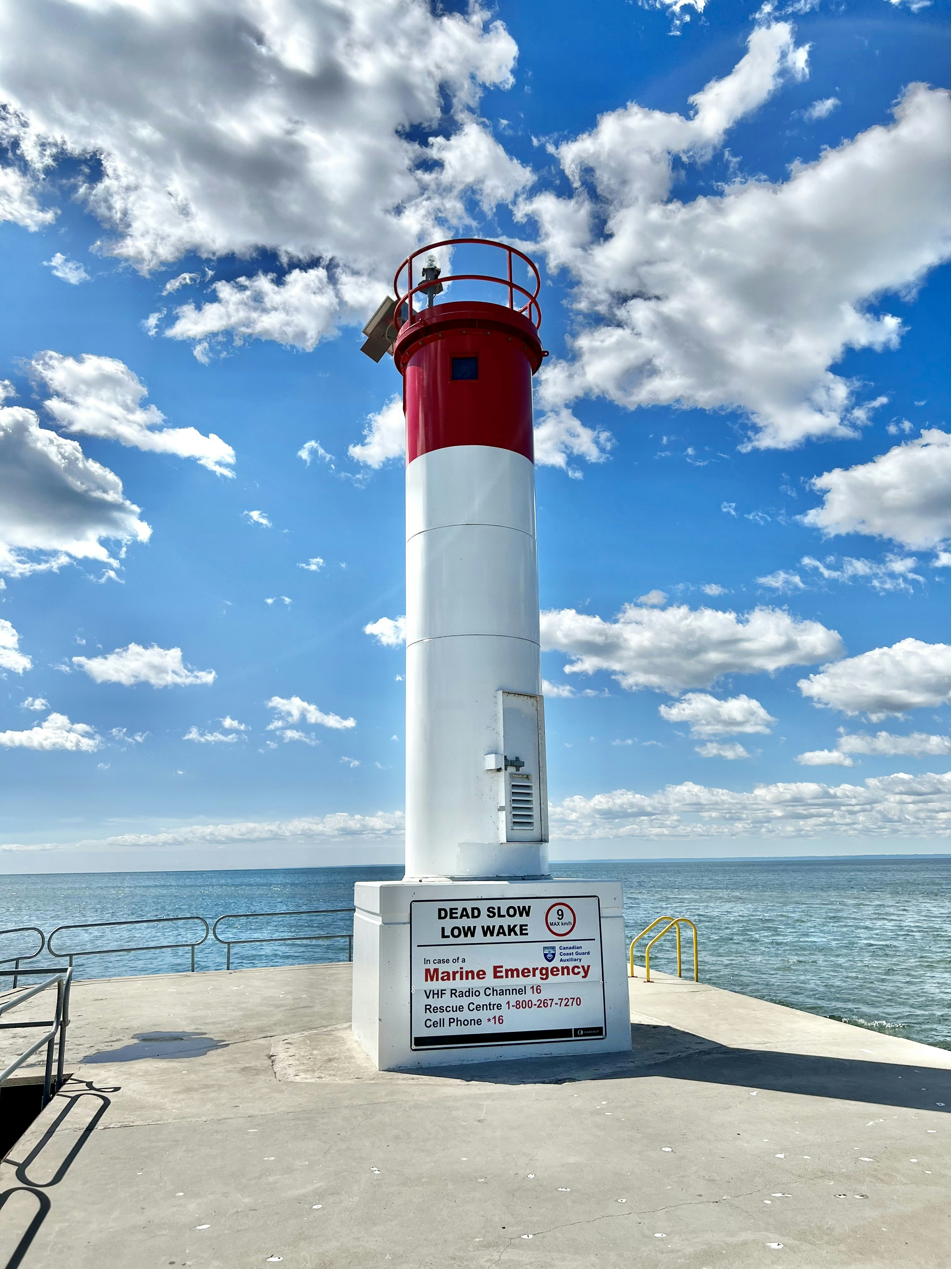 Lighthouse on the pier at Oakville Harbour in soft blue light