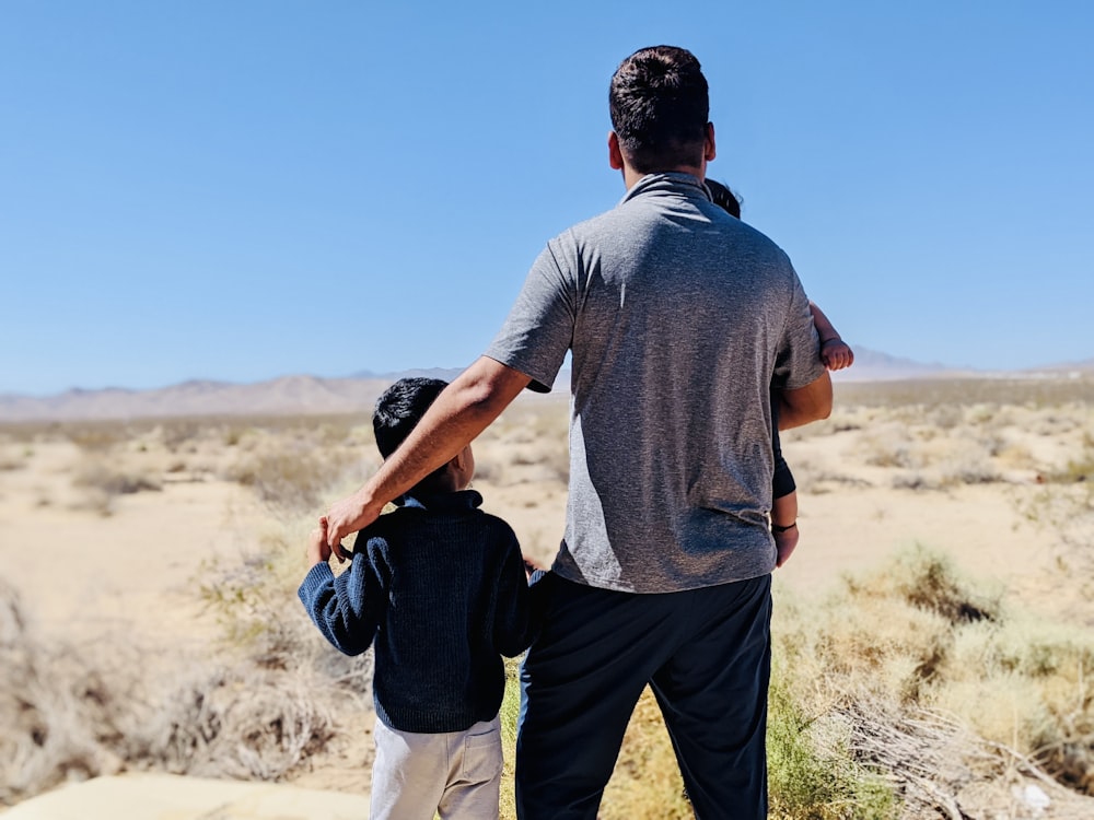 a man holding a child