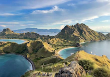 a body of water surrounded by mountains