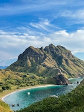 a body of water with Kahana Bay in the background