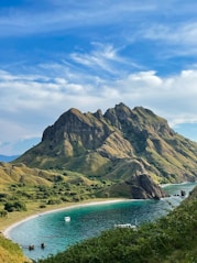 a body of water with Kahana Bay in the background
