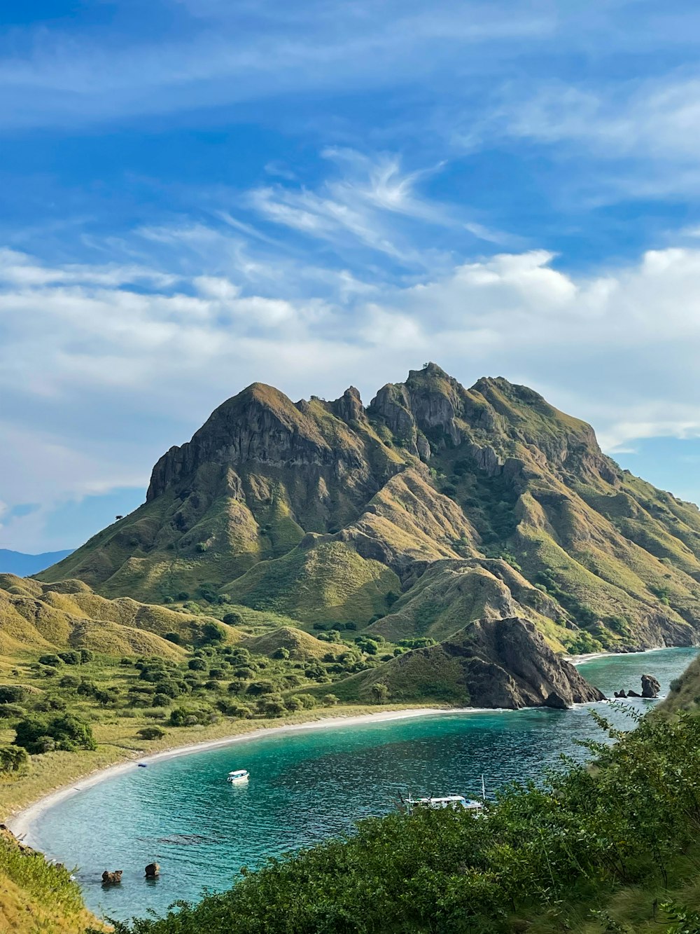 a body of water with Kahana Bay in the background