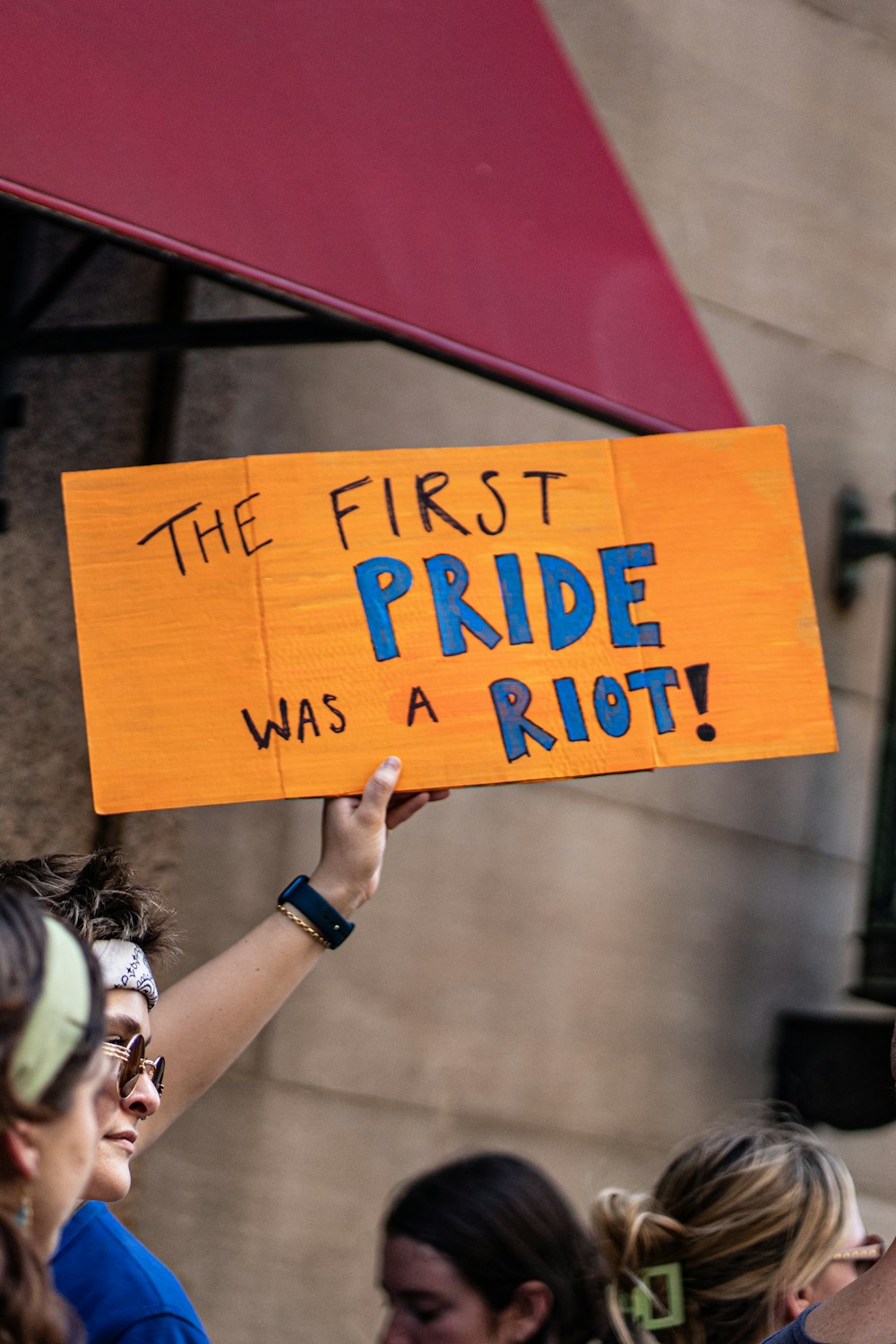 a person holding a sign