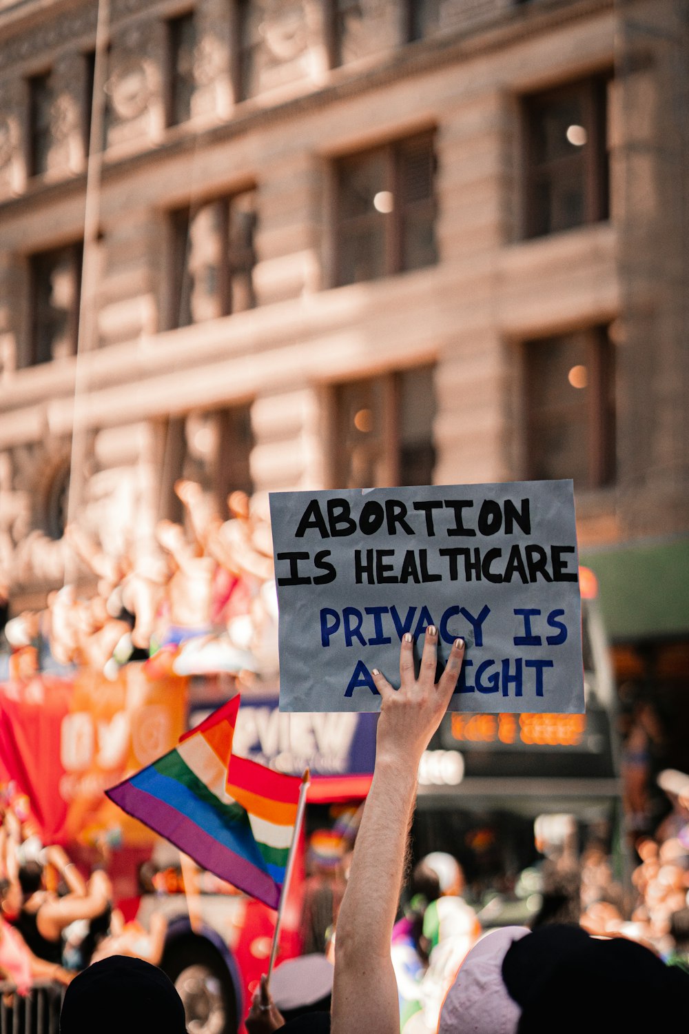 a group of people holding signs