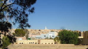 Scenic view of Españita town center with traditional buildings and clear sky