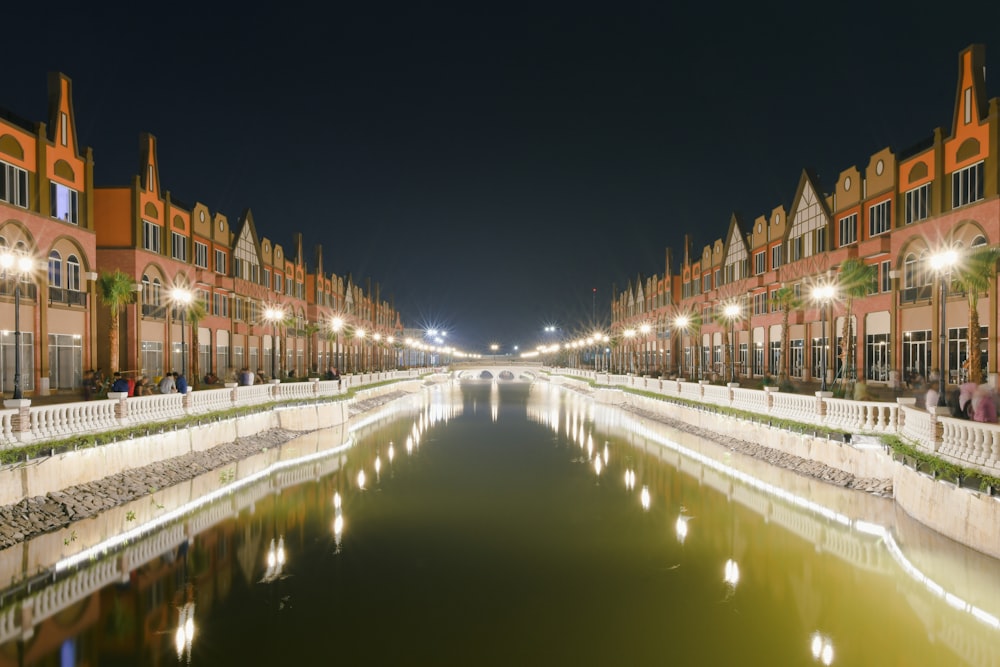 a pool of water surrounded by buildings