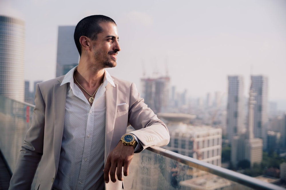 a man standing on a balcony