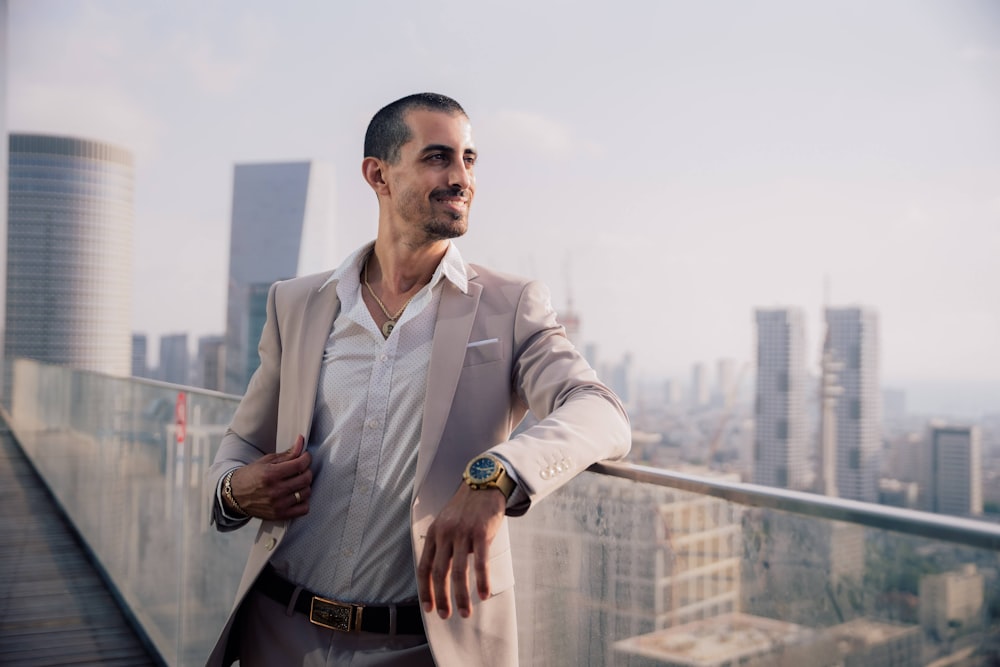 a man standing on a balcony