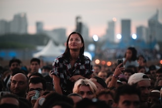 a person standing in a crowd