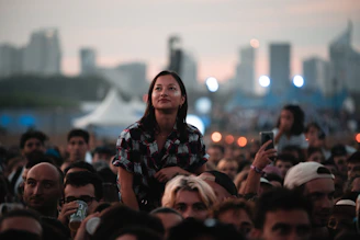 a person standing in a crowd