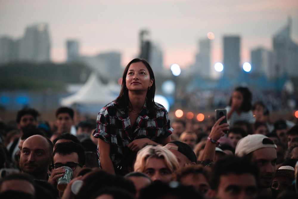 a person standing in a crowd