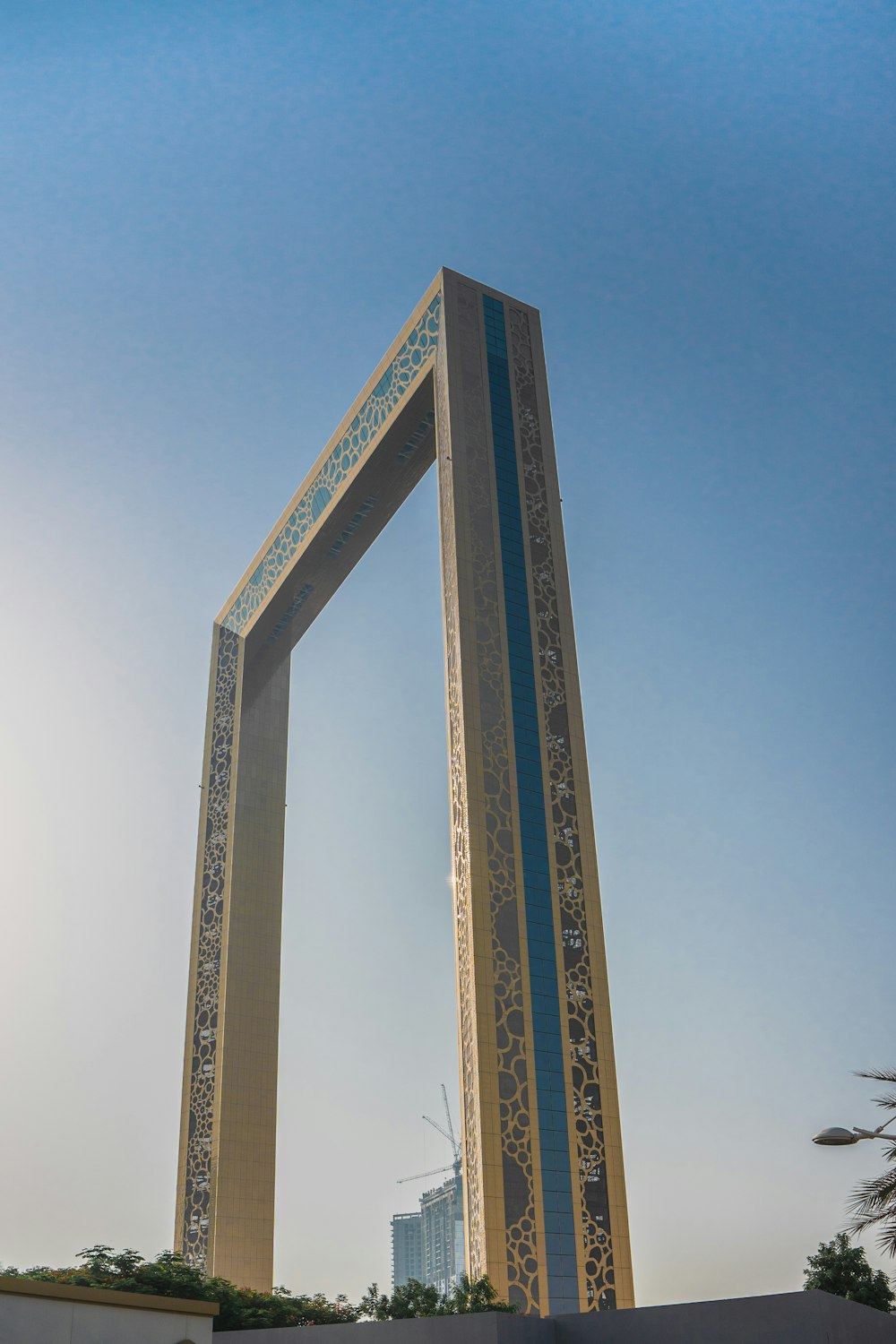 a tall building with a glass front