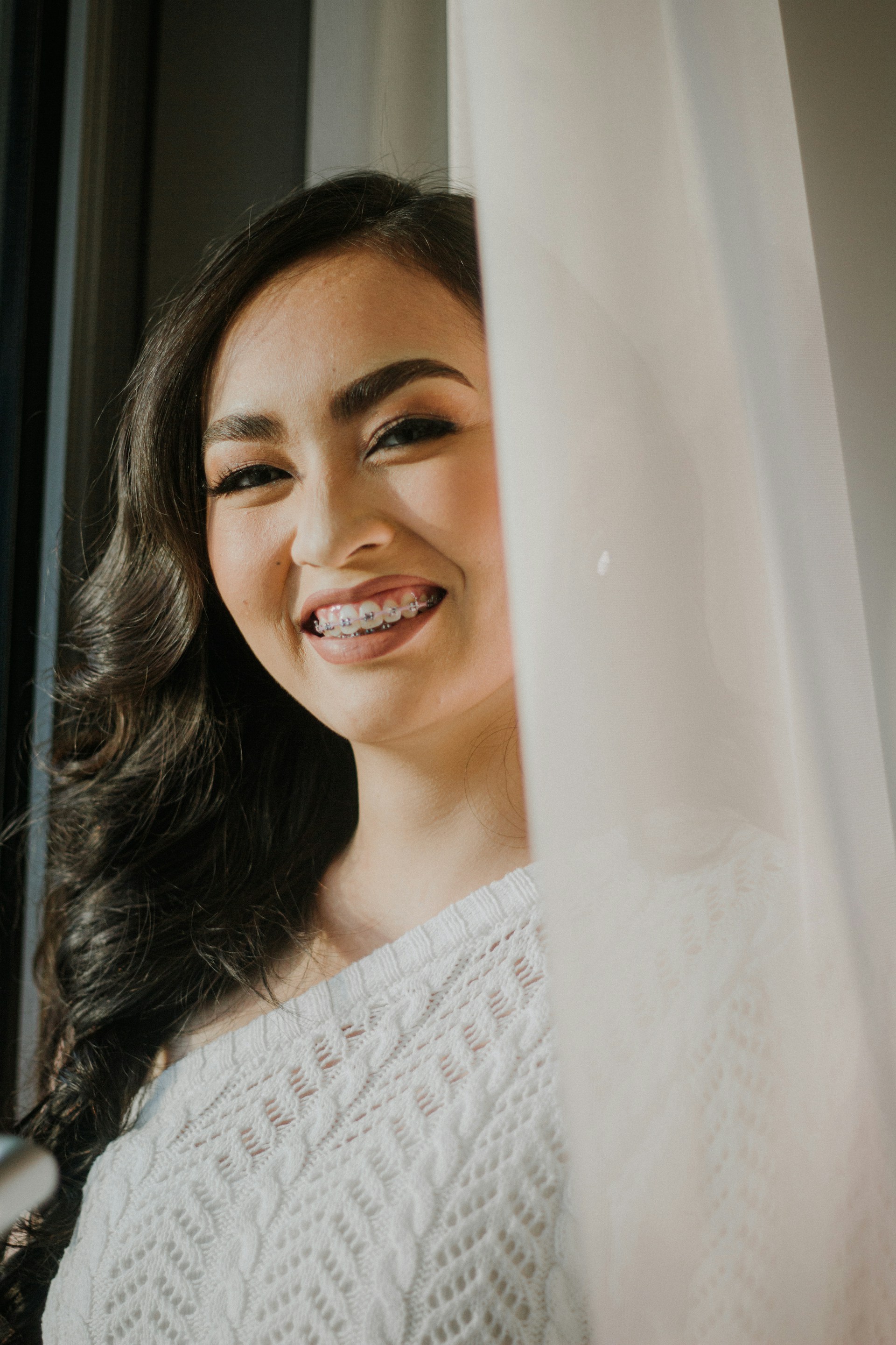a woman smiling for the camera