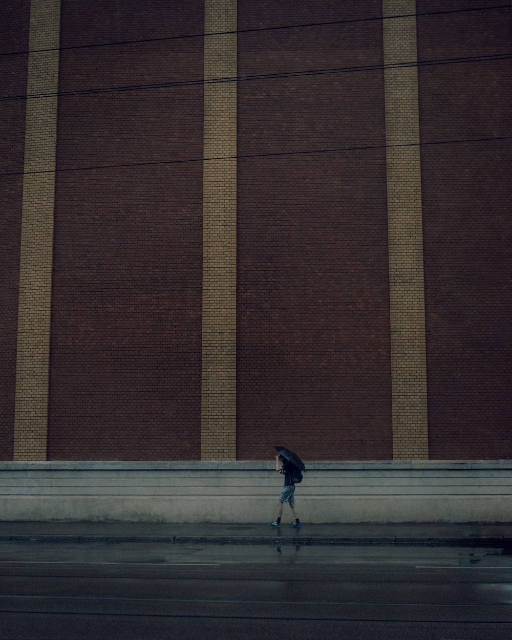 a person walking on a sidewalk
