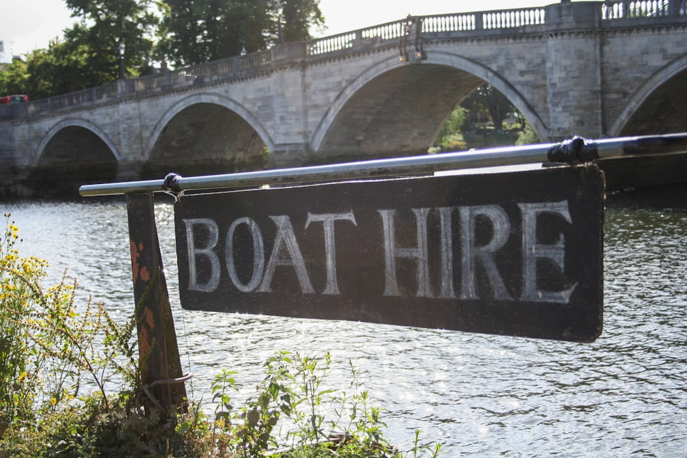 a sign on a bridge