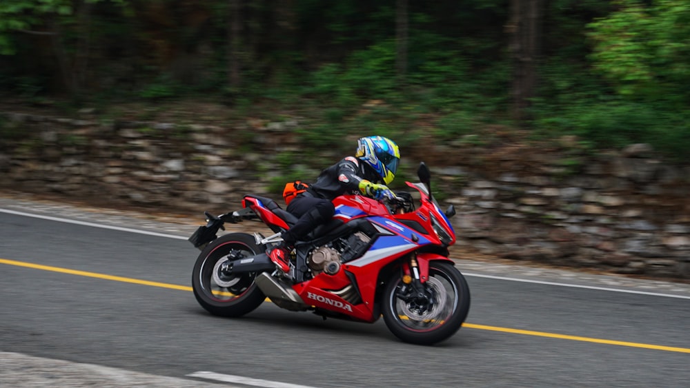 a person riding a motorcycle on a road