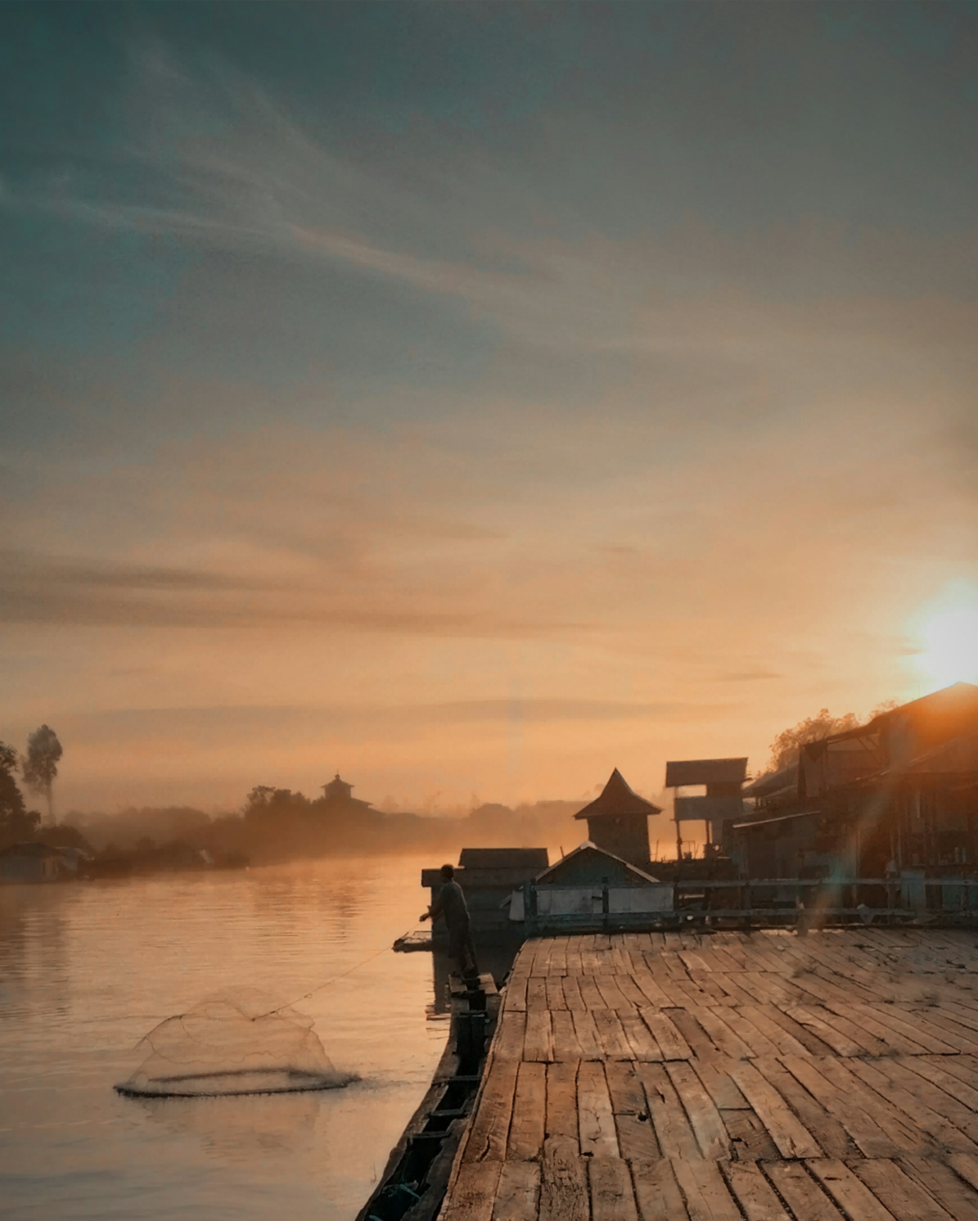 woman wearing yellow long-sleeved dress under white clouds and blue sky during daytime