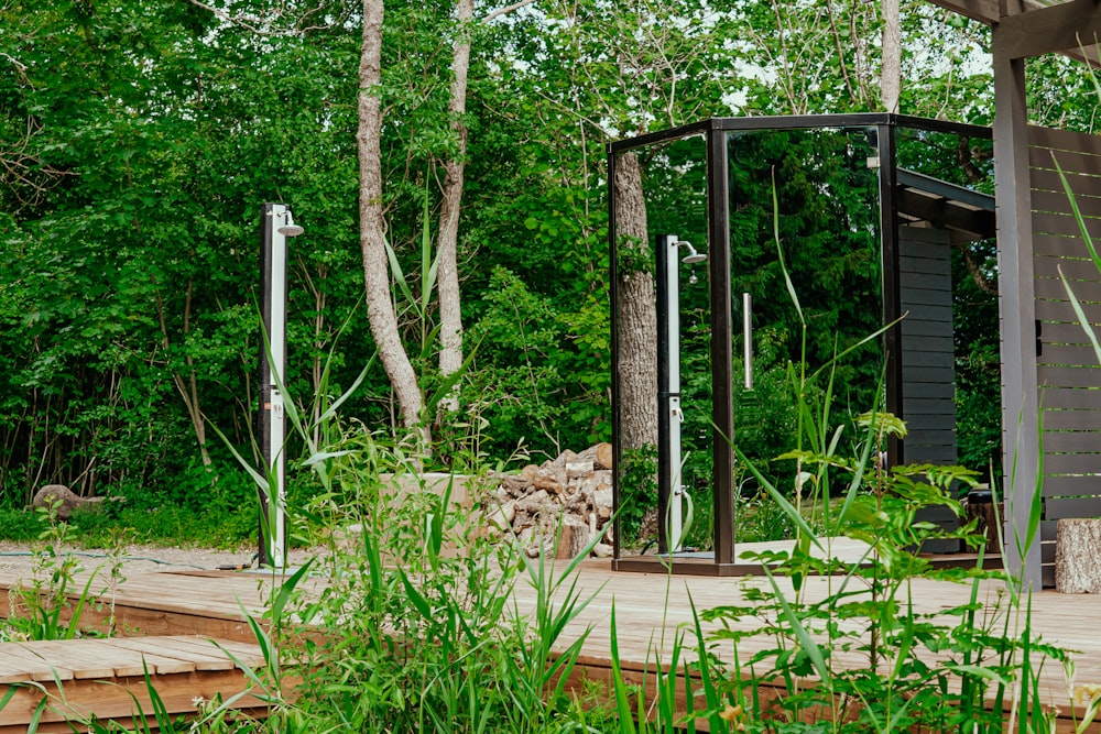 a gate in a wooded area