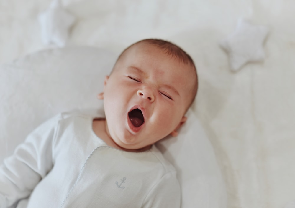 a baby with its mouth open