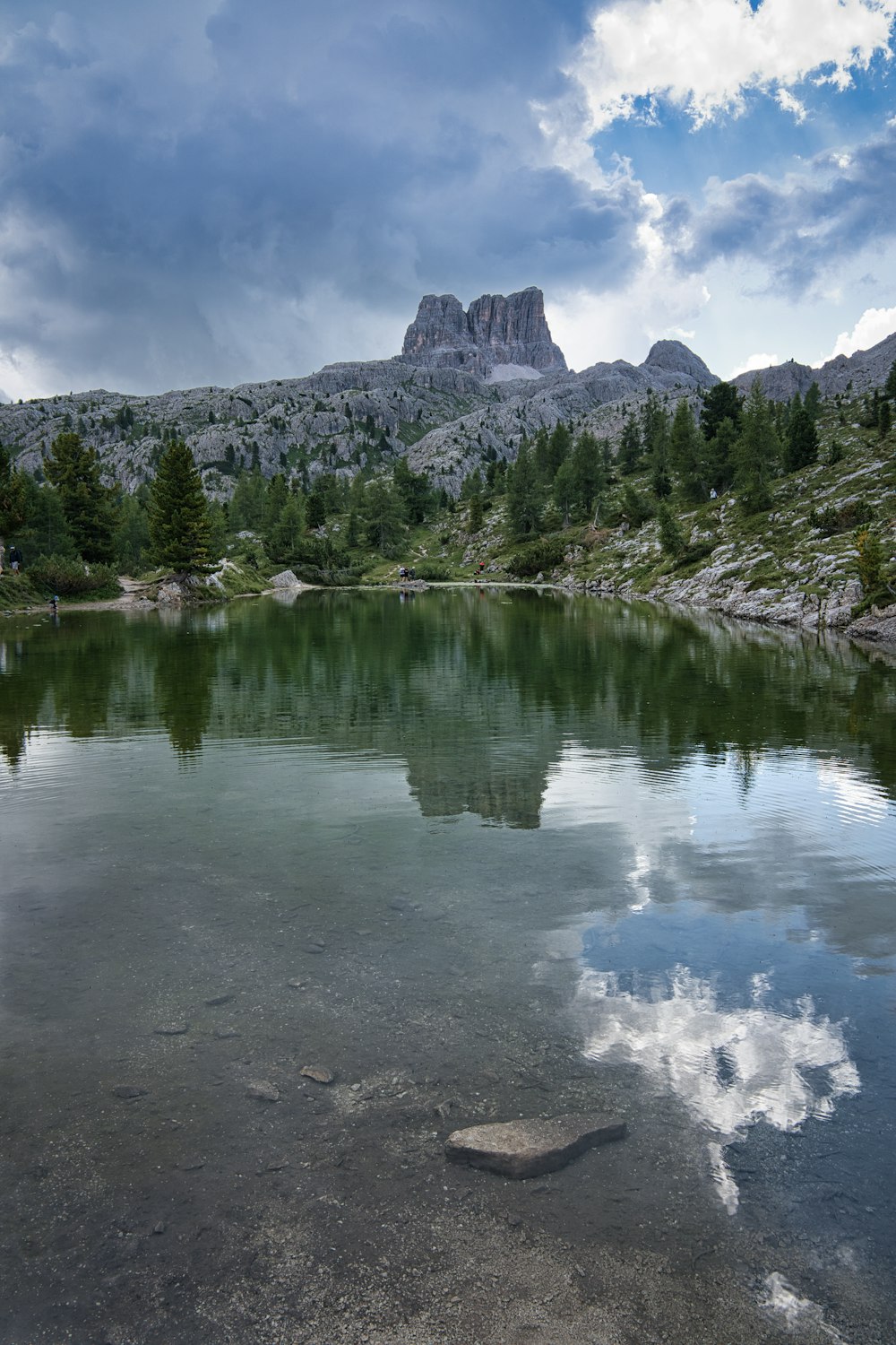 a lake with a mountain in the background