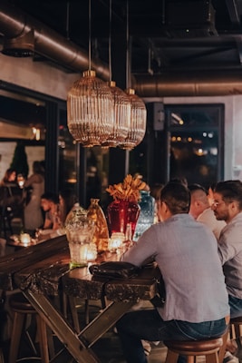 a group of people sitting at a table