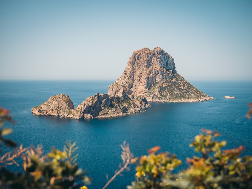 a rocky island in the ocean