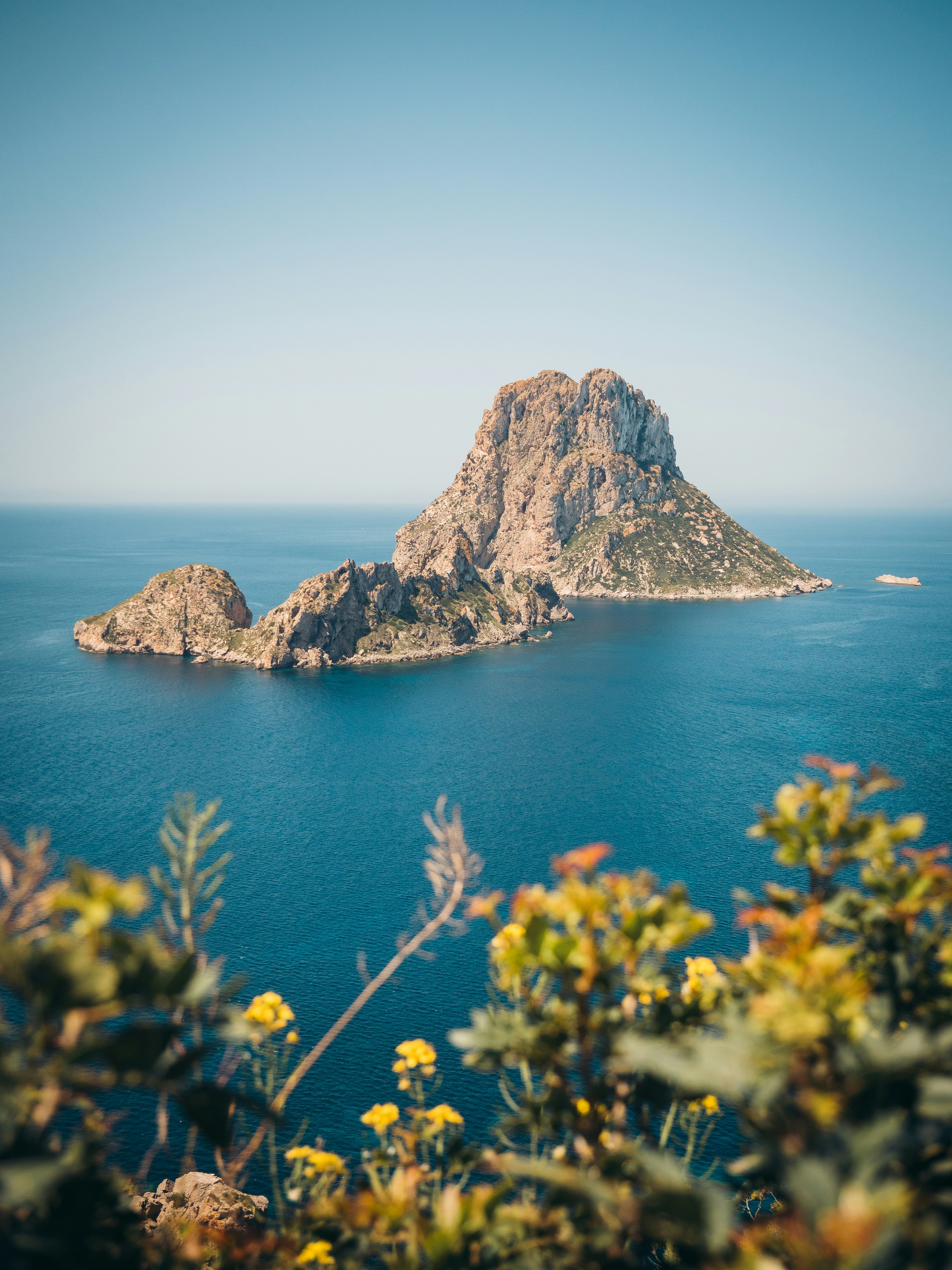 a rocky island in the ocean