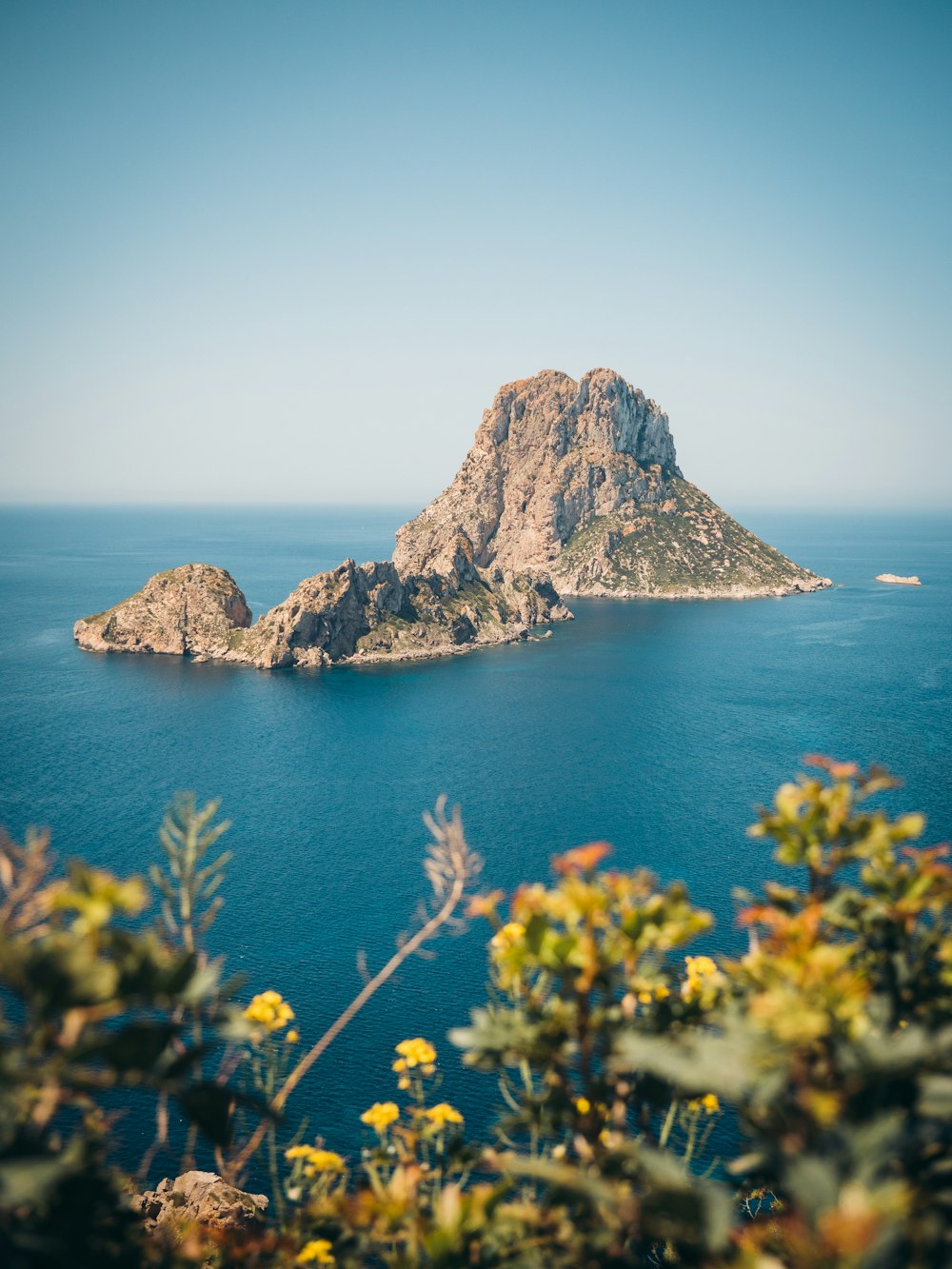 a rocky island in the ocean