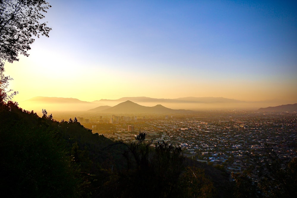 a city with a mountain in the background