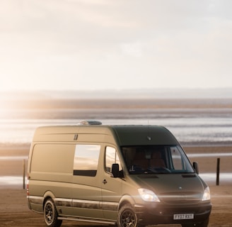 a van parked on a beach