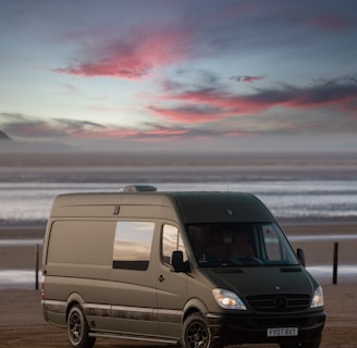 a van parked on a beach