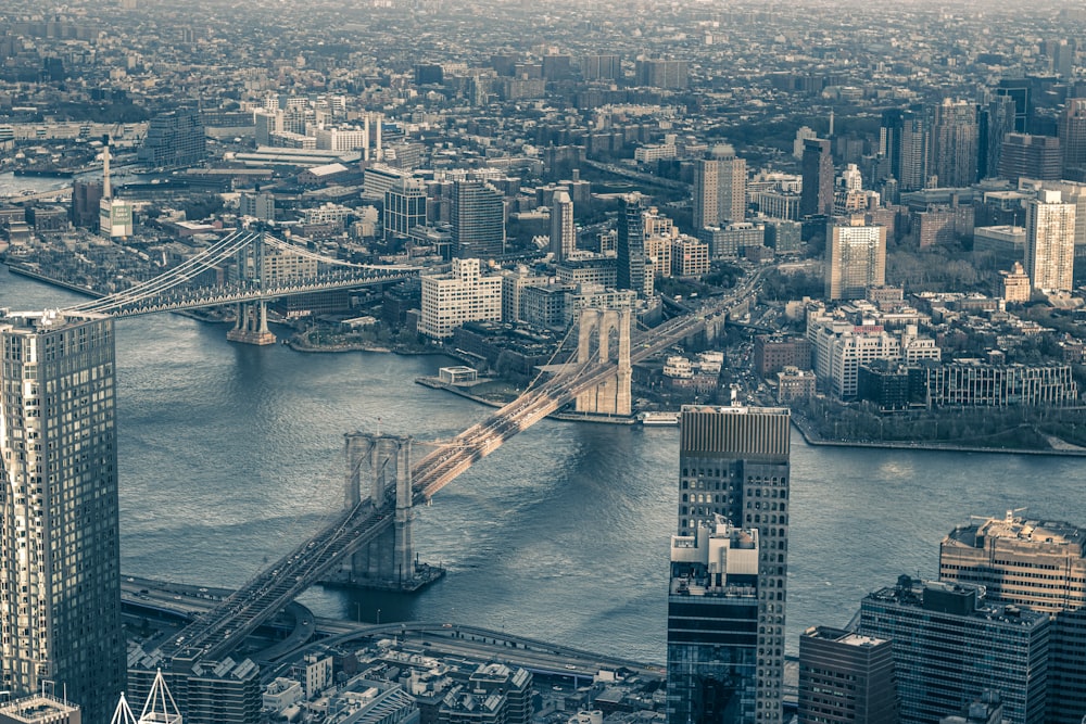 a bridge over a river in a city