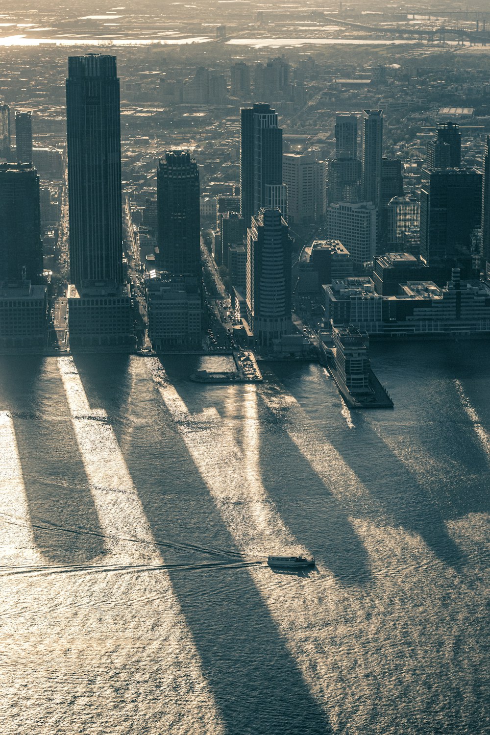 a city skyline with a river