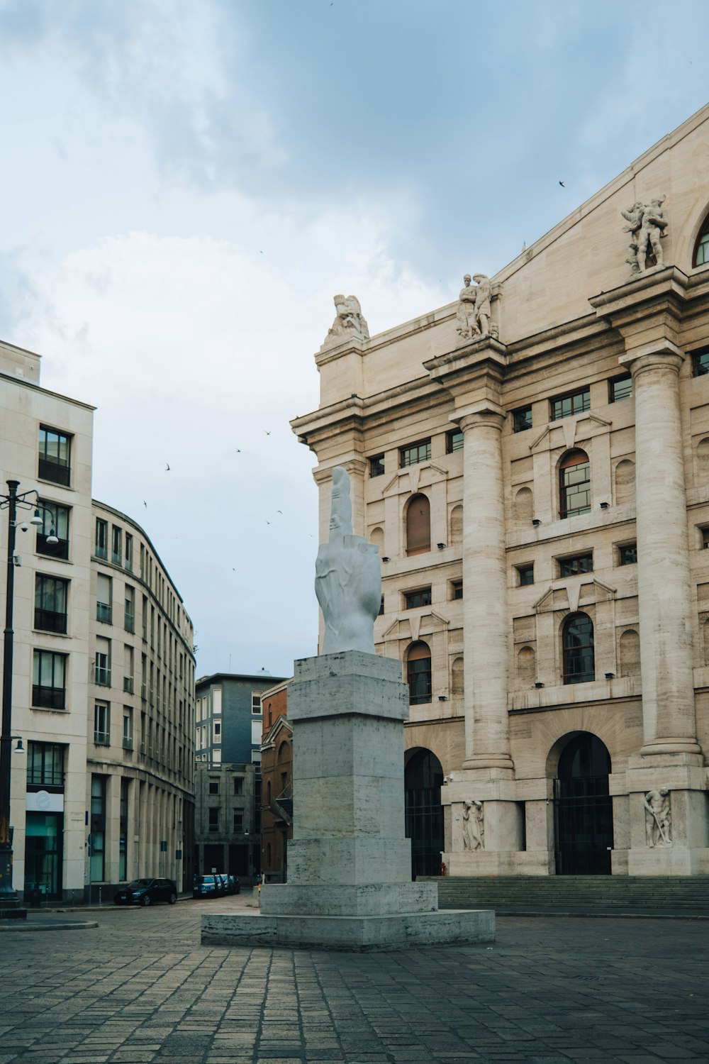 a statue in front of a building