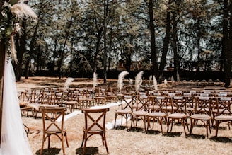 a group of tables and chairs outside