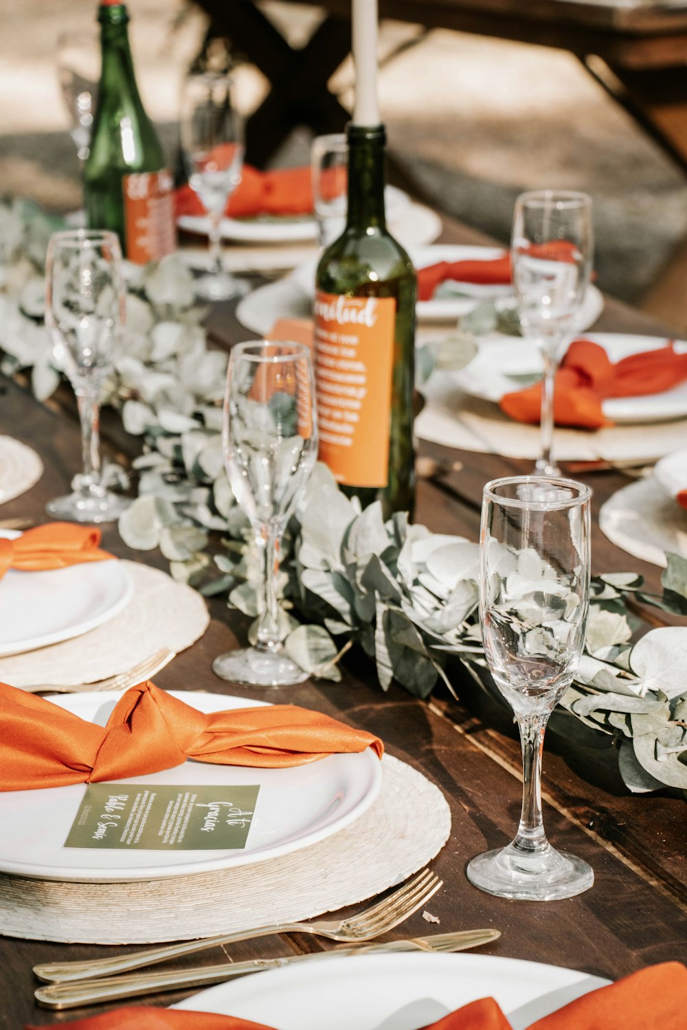 a table with plates and glasses