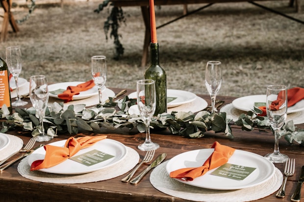 a table with plates and glasses