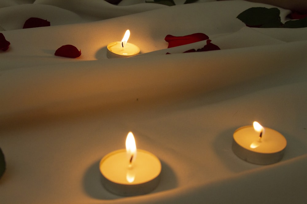 a group of candles on a table