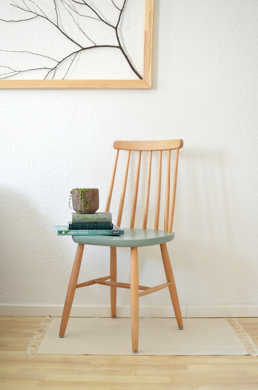 a chair with books on it