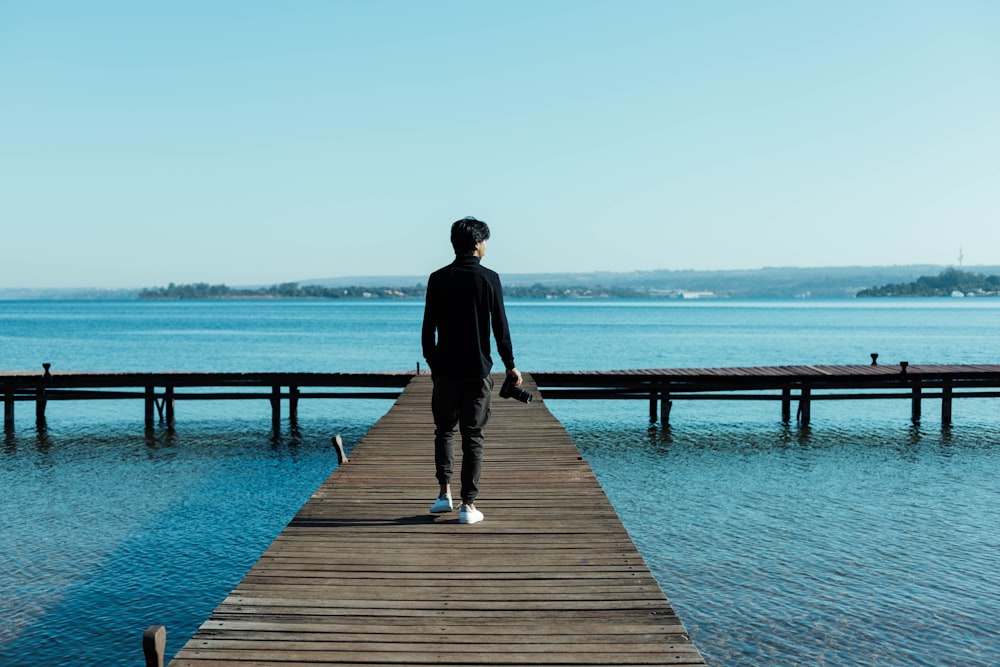 a person standing on a dock