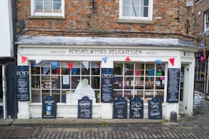 a store front with signs