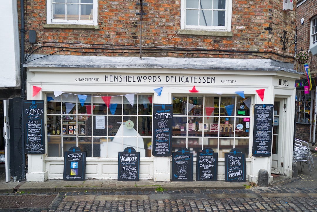 a store front with signs, Shopwindow
