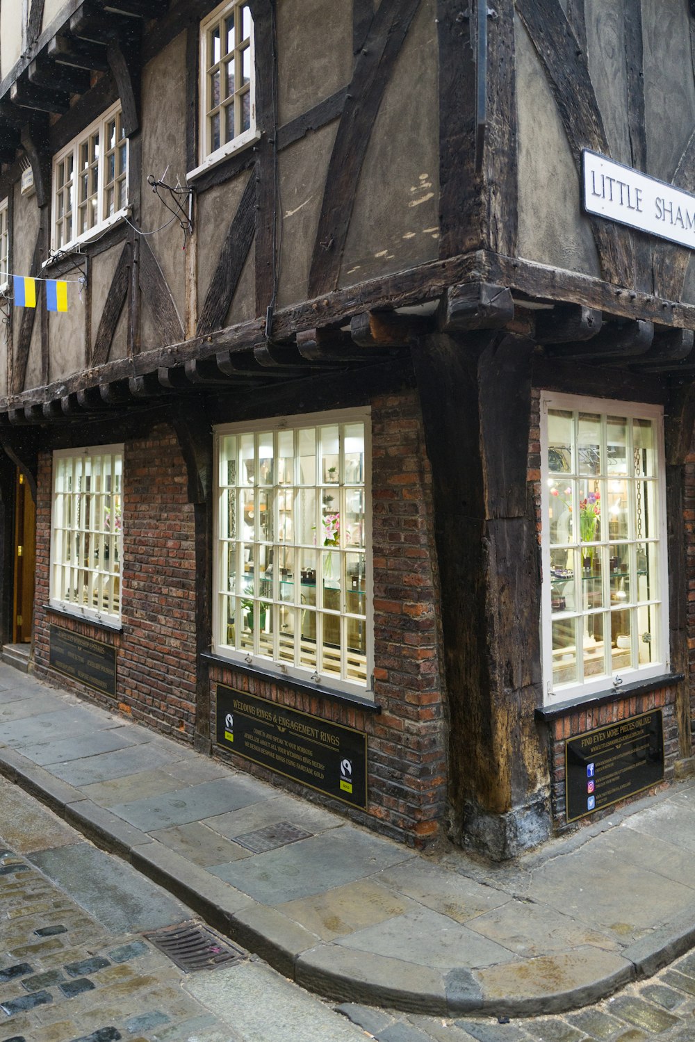 a brick building with a sign on the front