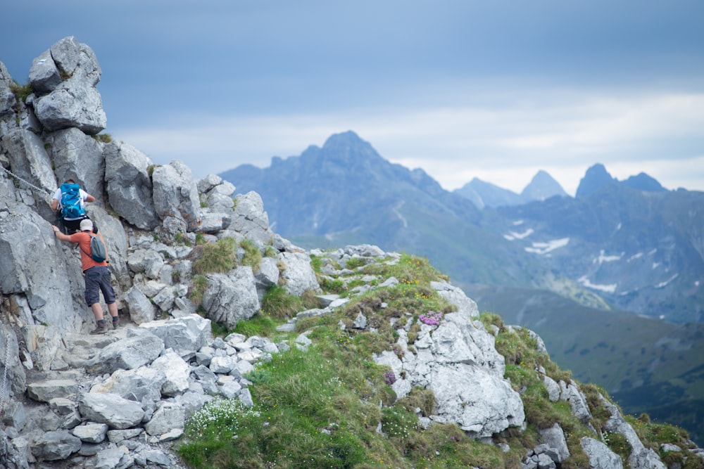 a person climbing a mountain