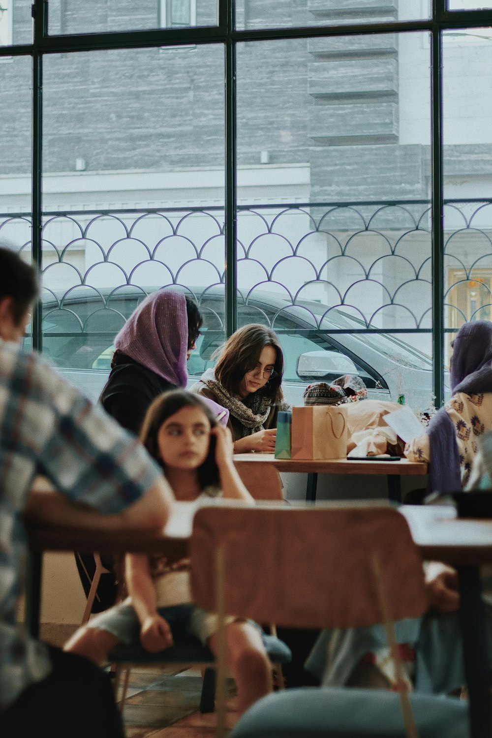 a group of people sitting at tables