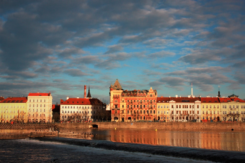 a body of water with buildings along it