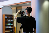 a man holding a camera