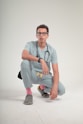 a man squatting down